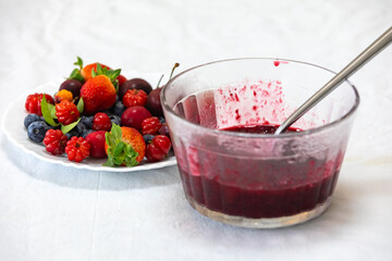 Traditional artisanal jam made from organic red fruits. Creative food