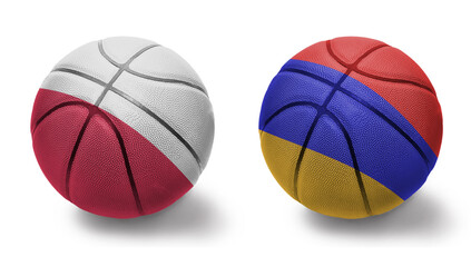 Fototapeta premium basketball balls with the national flags of armenia and poland on the white background.