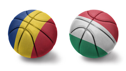 Obraz premium basketball balls with the national flags of hungary and romania on the white background.