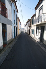 narrow road with residental houses, portugal