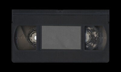 Obraz premium VHS old cassette front side, isolated video tape with clear area for mockup on black background in retro Y2K style