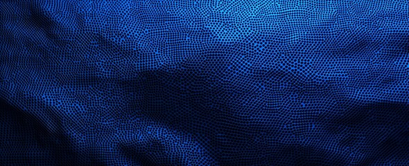 Close-up of a textured blue surface, creating an abstract and visually appealing pattern.