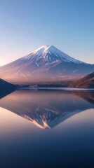 Fototapeta premium Serene Aerial View of Majestic Mountain Reflecting in Calm Ocean Waters
