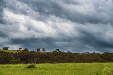 Obraz premium Afternoon storm clouds over the rural countryside