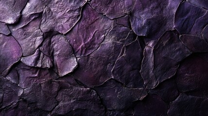 Obraz premium Close-up of abstract, textured, layered, dark purple cracked surface