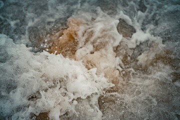 Foamy water at the ocean