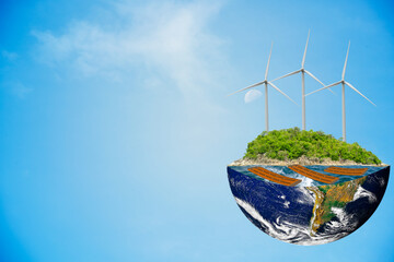 Wind turbine and wave energy at the ocean on the world half and on blue sky background.Renewable...