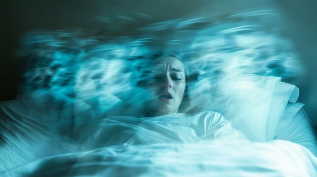 Woman suffering sleep paralysis with hallucinations in bed