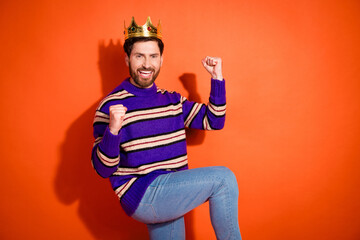 Photo portrait of attractive young man king winning dressed stylish striped purple clothes isolated...