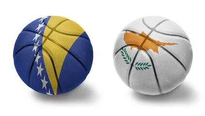 basketball balls with the national flags of cyprus and bosnia and herzegovina on the white...