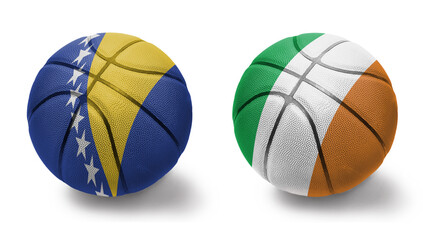 basketball balls with the national flags of ireland and bosnia and herzegovina on the white...