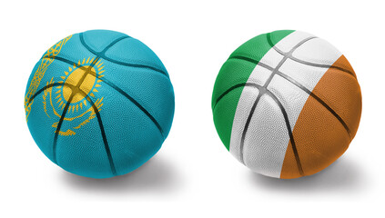 basketball balls with the national flags of ireland and kazakhstan on the white background.