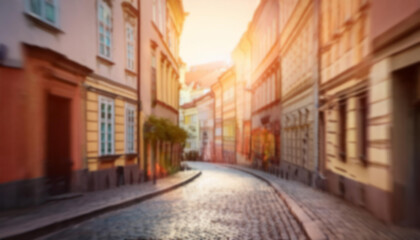 Obraz premium A blurred background of a charming European street, with cobblestone roads