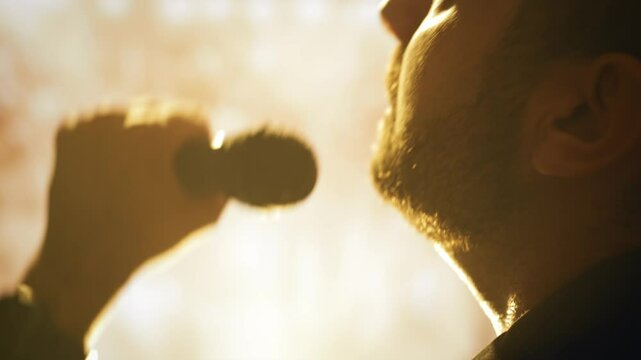 Singer Performer Silhouette Recording Emotional Music Studio Backlit Artistic Expression Entertainment