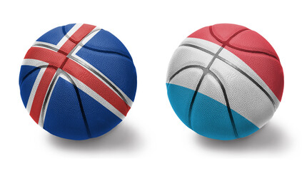 basketball balls with the national flags of luxembourg and iceland on the white background.