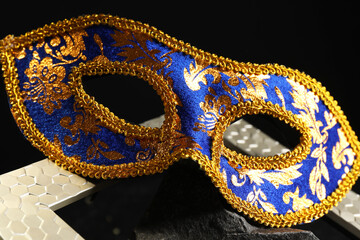 Beautiful carnival mask on dark background, closeup