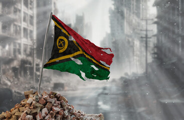 Dirty and torn Vanuatu flag, symbol of resistance and victory. A scene of war and devastation, the ruins of a city destroyed by conflicts. 3D Rendering.