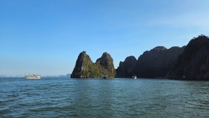 Amazing limestone rocks island in Ha Long bay, Vietnam in sunset.