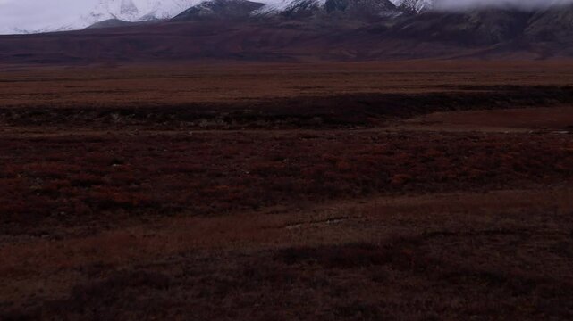 Snowy Mountain Range Near Dempster Highway In Yukon, Canada - Drone Shot