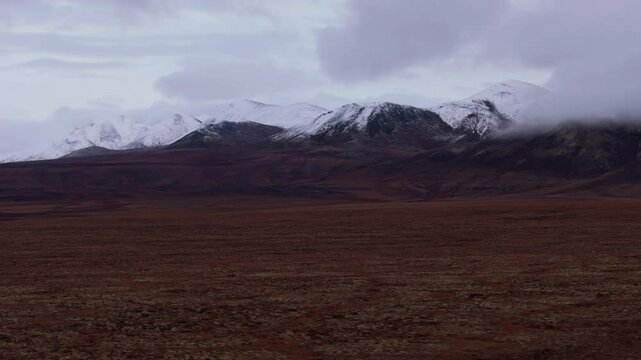 Snowy Ogilvie Mountains On The Dempster Highway In Canada - Drone Shot
