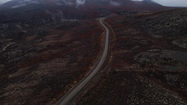 Dempster Highway And Ogilvie Mountain Range In Yukon, Northwest Territories, Canada. Aerial Drone Shot