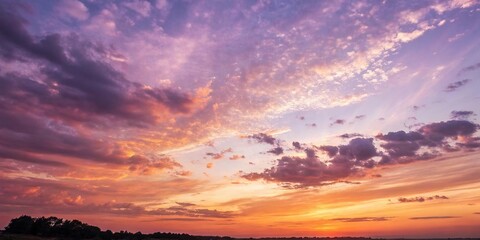 Fototapeta premium Abstract watercolor sunset sky background with warm orange hues blending into soft purple tones, abstract art, abstract, gradient sky, serene landscape