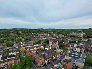 Obraz premium High Angle View of British Historical City of Winchester Central During Sunset, England United Kingdom, Aerial Footage Was Captured with Drone's Camera From Medium High Altitude on May 17th, 2024