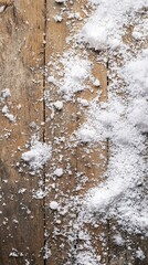 Obraz premium Winter snow on a rustic wooden surface