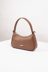 Women's luxury handbag, brown handbag purse, leather bag isolated on white background