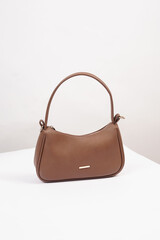 Women's luxury handbag, brown handbag purse, leather bag isolated on white background