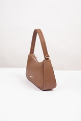 Women's luxury handbag, brown handbag purse, leather bag isolated on white background