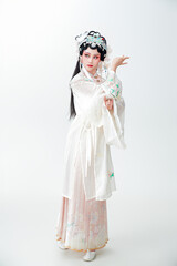 Fototapeta premium Asian beauty in traditional Chinese opera costume on white background