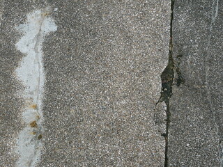 The path is made of cement.