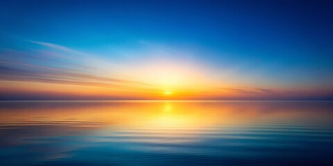 Fototapeta premium Serene Sunset Over Calm Water, Painted With Hues of Orange, Yellow, and Blue