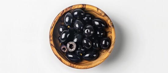 Fototapeta premium Black Olives in Wooden Bowl