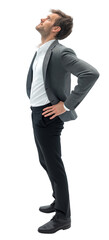Man in formal attire looks upward with confidence in a studio setting during daylight