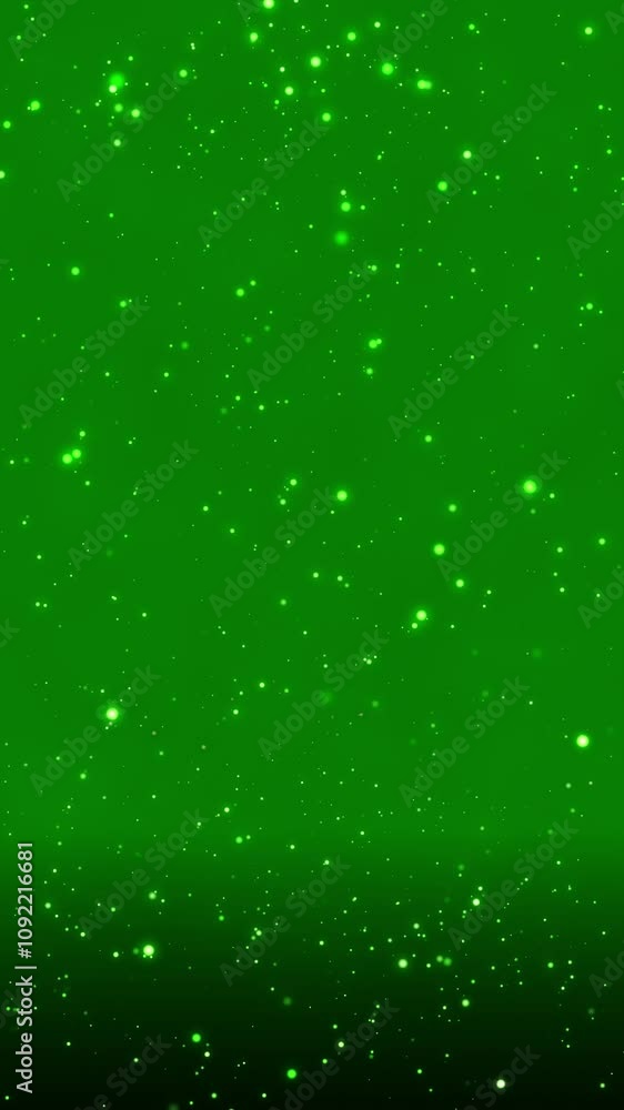Poster green bokeh particles floating in the air and falling to the ground on a dark background, vertical c