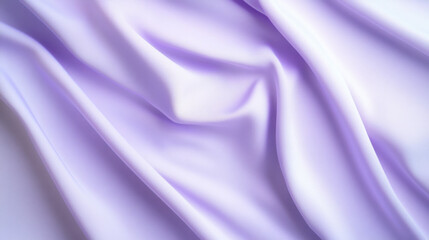 Obraz premium Soft lavender silk fabric draped and folded elegantly for textile display
