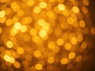 Obraz premium Shimmering gold bokeh light background with abstract glowing lights and soft focus, backdrop