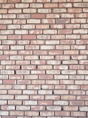 Obraz premium Old, weathered brick wall background with texture and rustic charm, solid