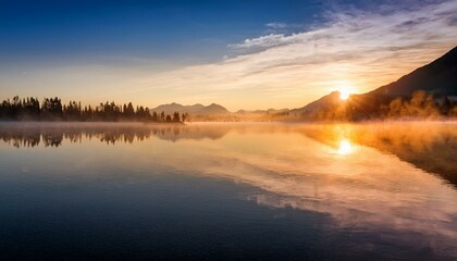 Golden Sunrise Over a Misty Alpine Lake with Serene Reflections and Majestic Mountains