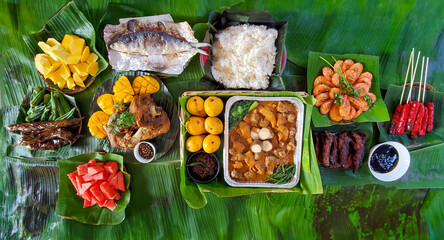 Traditional Filipino Feast on Banana Leaves