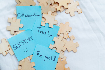 Collaboration and trust building in business office environment visual content puzzle piece concept...