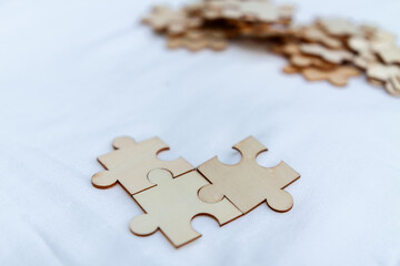Fototapeta premium Strategic business solutions office workspace puzzle pieces minimalist environment close-up view problem-solving concept