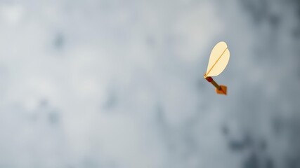 A flying dart arrow in motion against a blurred background, dartboard