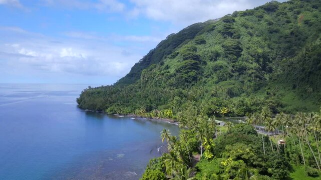 Tautira Bay North Shore Tahiti island French Polynesia aerial drone Vallee de Teahupoo Taiarapu Papara Tavera Vaitepiha River village farmland coastline South Pacific Ocean backwards motion