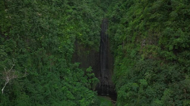 Vairao Taiarapu Vaimahutu Faarumai Matiti Teahupoo Waterfall Falls Tahiti Island aerial drone French Polynesia dense lush green jungle forest Les Trios Cascades pool nature circle left motion