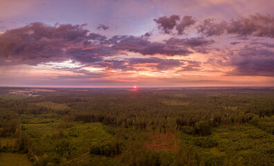 Beautiful storm sky over fields - drone panoramic view.