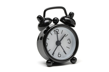 black retro alarm clock isolated on white background.