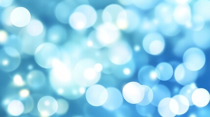 Light blue background with soft defocused lights and bokeh effect for versatile creative and abstract designs